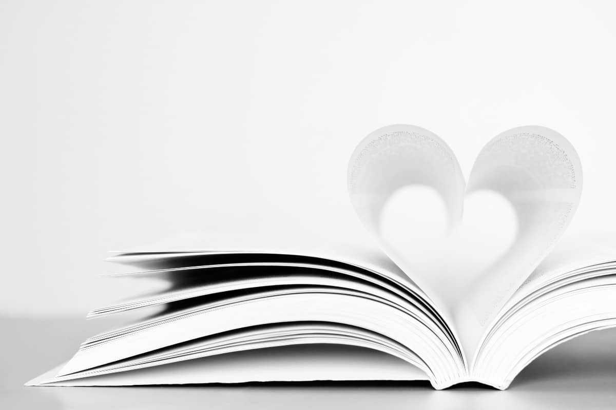 Open book with a paper heart